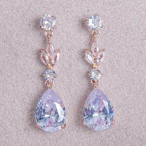 Rose gold earring with purple stone